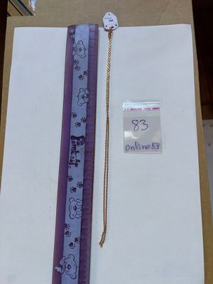 a picture of a piece of paper with a ruler attached to it