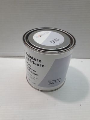 an image of a can of paint sitting on a table