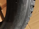 a close up of a bike tire on a cardboard box