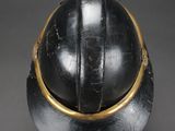 a close up of a helmet on a black surface