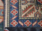 an image of a close up of a rug with a cat on it