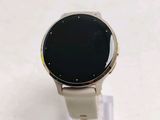 a smart watch sitting on a stand on a table