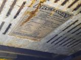 a picture of a dirty air conditioner sitting on the floor