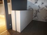 an image of a room with a marble wall and floor