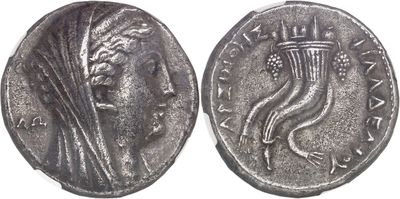 a close up of a coin with a woman ' s face on it