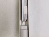 a toothbrush and toothpaste holder in a box