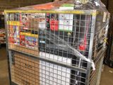 a cart with a lot of items in it in a warehouse