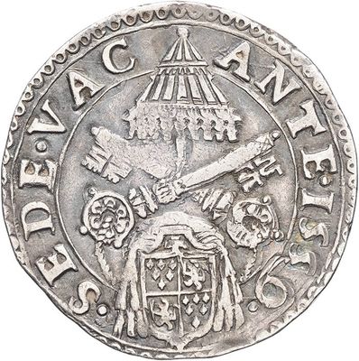 a close up of a silver coin with a crown on it
