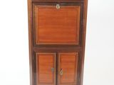 an image of a small cabinet with a marble top
