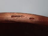 an image of a close up of a metal bowl on a table
