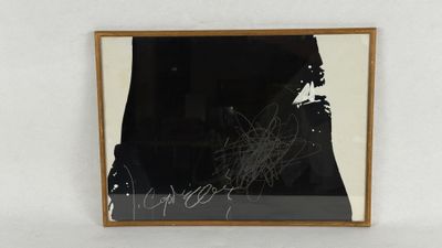 framed photograph of a black and white photograph of a man with a cigarette