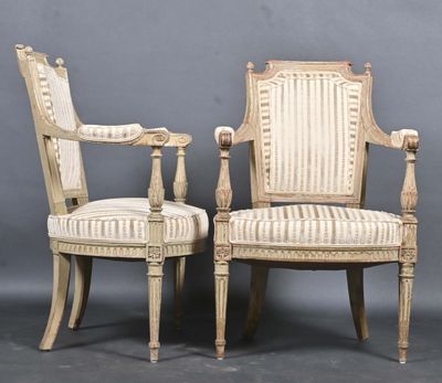 pair of louis xvi style armchairs with stripped upholstered upholstered arms