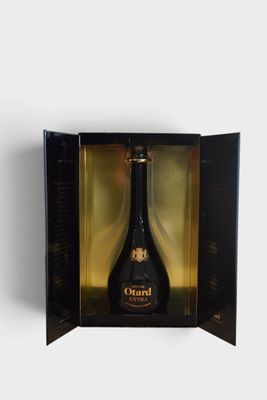 an open box with a bottle of wine inside of it