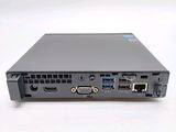 the back of a laptop with two ports connected to each other
