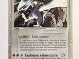 a close up of a pokemon card on a table