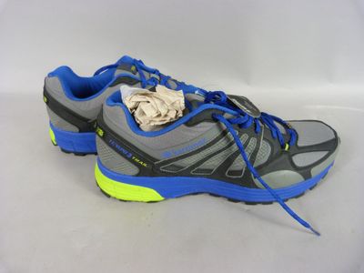 the shoe is gray and blue and has a yellow lace