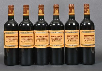 six bottles of wine are lined up in a row on a table