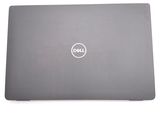 the dell laptop is open and ready to be used