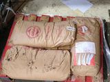 bags of food sitting on top of a pallet