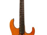 an orange electric guitar sitting on top of a white surface