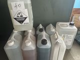 a lot of plastic containers that are sitting on the floor