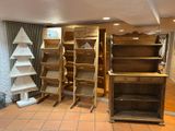 a room with a shelf and shelves in it