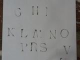 a piece of paper that has letters written on it