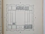 an open book with a drawing of a room in it