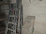 a ladder leaning against a wall in a room
