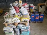 a pile of bags and bags of food on a pallet