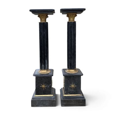 pair of black marble and brass candlesticks