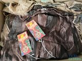 two tags that are on the back of a bag