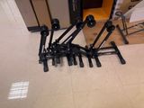 a lot of black metal objects on the floor
