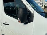 a white van that is parked in a parking lot