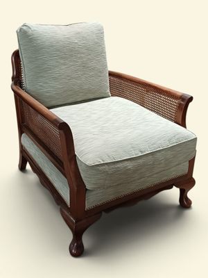 une image représentant une chaise sur laquelle est posé un coussin