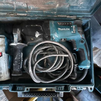 a box with tools in it that is sitting on a table