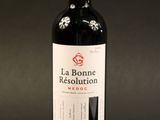 a bottle of wine that is sitting on a table
