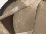 a close up view of a drum with a stick sticking out of it