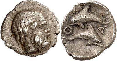 a silver coin with an image of a man on it