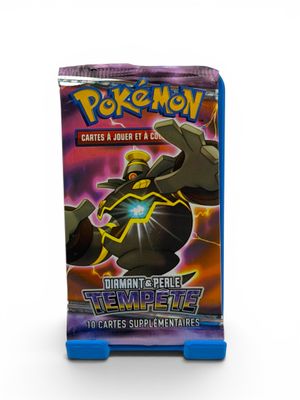 a close up of a box of pokemon cards on a white background