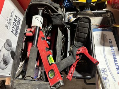 a suitcase full of tools that are sitting on a table