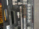 an open tool case with tools inside of it