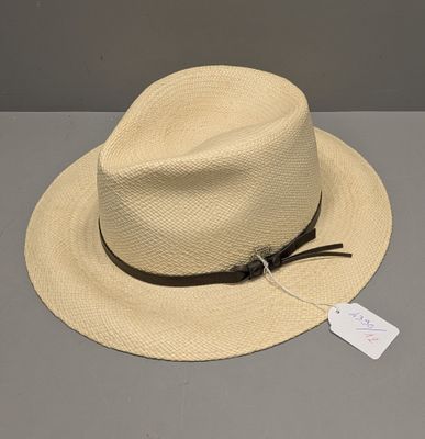 a white hat with a black band and a tag on it