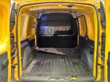a yellow van with the door open and the back door open