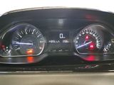 a close up of a car dashboard with various gauges
