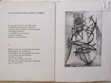 an open book with a drawing of a man on it