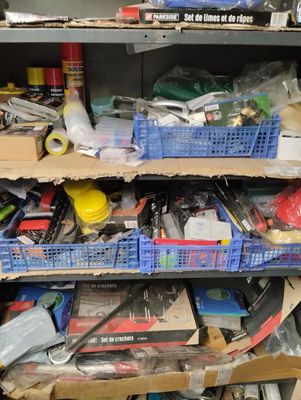 a shelf full of assorted items in a store
