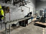 a man that is working on a machine in a factory