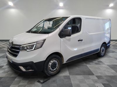 the white van is parked on a checkered tile floor