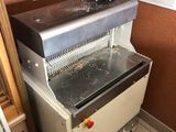 a machine that is sitting in the corner of a room